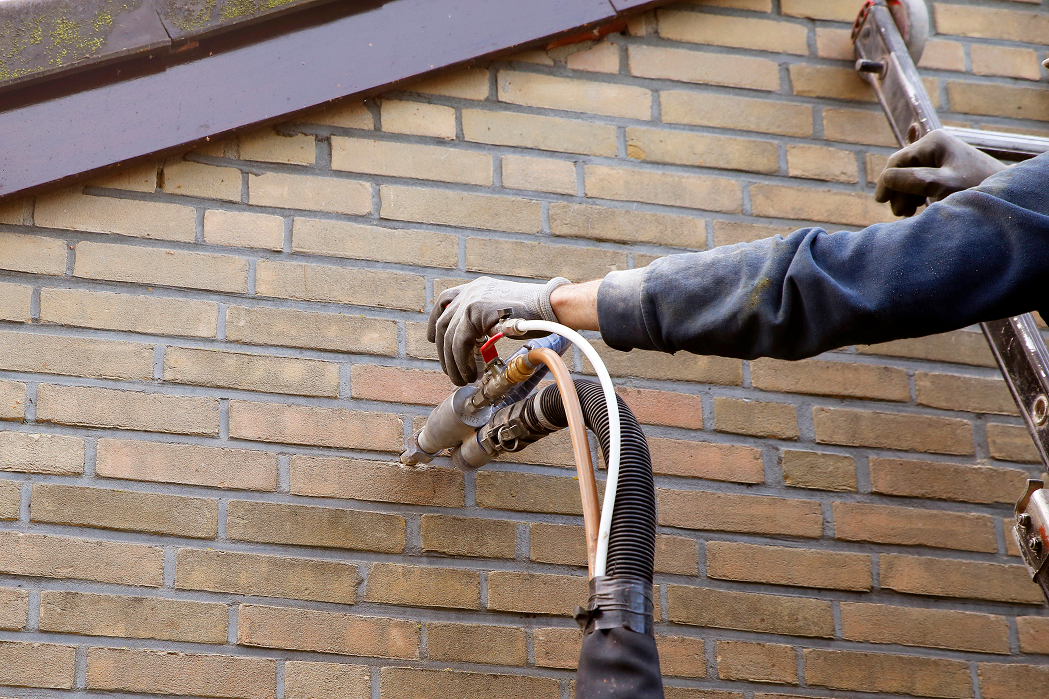Injecting Kore-Fill bonded beads into house cavity