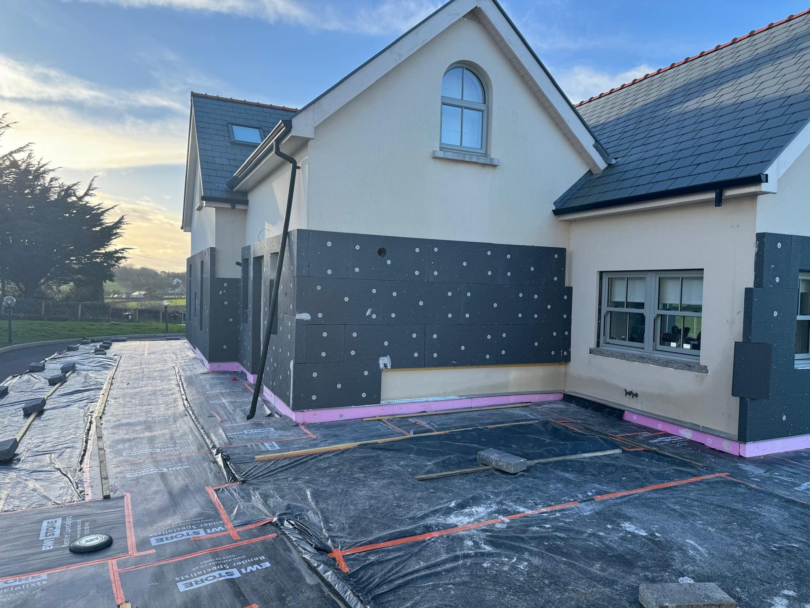 House before external wall insulation wrap in Donegal